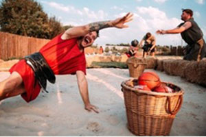 Men playing roman games at a Liverpool hen and stag do
