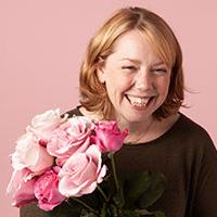 wedding flowers: Caroline Grimble – Bloom & Wild’s Lead Florist – with a bouquet 