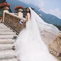 Bride walking up stairs in wedding dress Bride walking up stairs in wedding dress