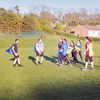 Men playing qudditch on a stag do
