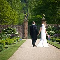 married couple walking hand in hand married couple walking hand in hand