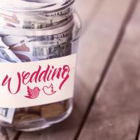 Top tips for sticking to your wedding budget saving money
