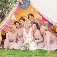 Girls sat in glamping tent at wedding Girls sat in glamping tent at wedding