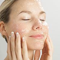 Woman performing beauty regime